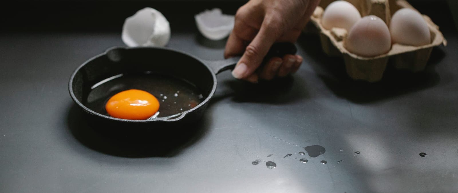 Close-up of a well-seasoned cast iron cooking surface